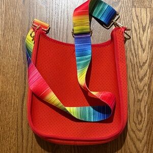 Stylish Red Perforated Shoulder Bag with Multicolor Strap